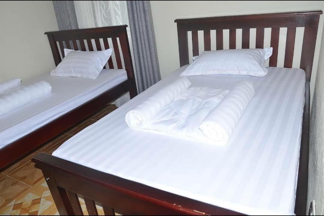 Migingo Suites Ентебе Екстериор снимка